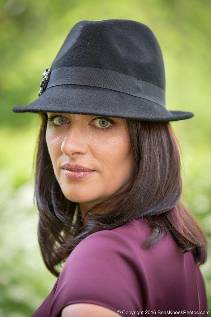 black hat with burgundy dress