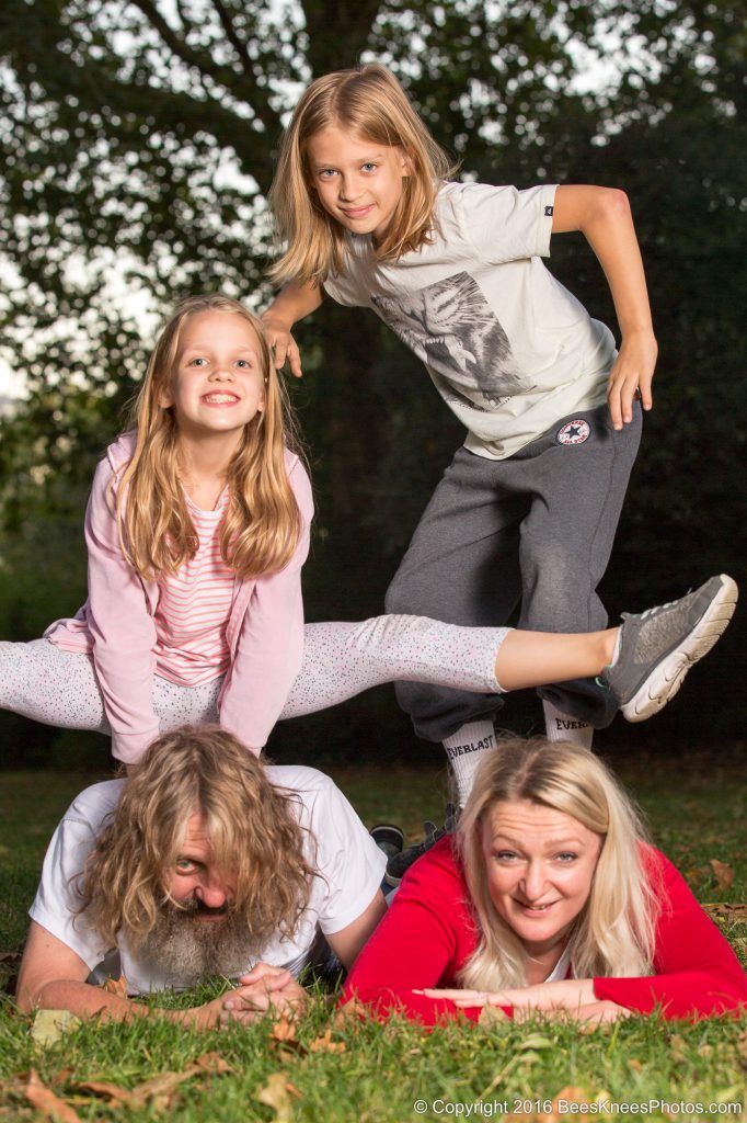 boy and girl leapfrogging their parents