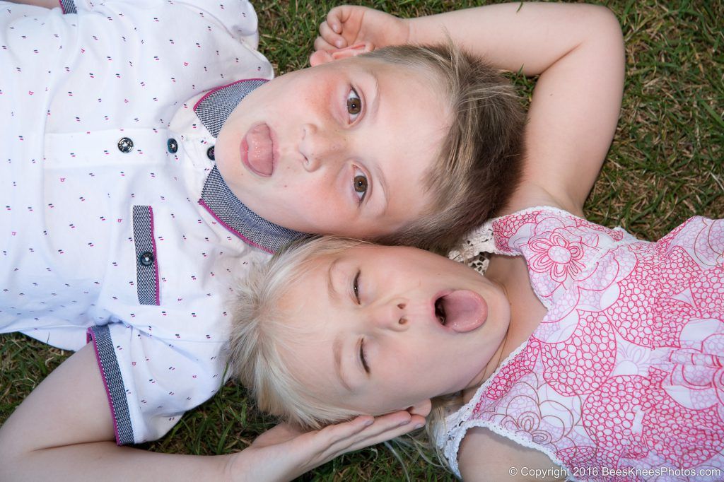 brother and sister making faces