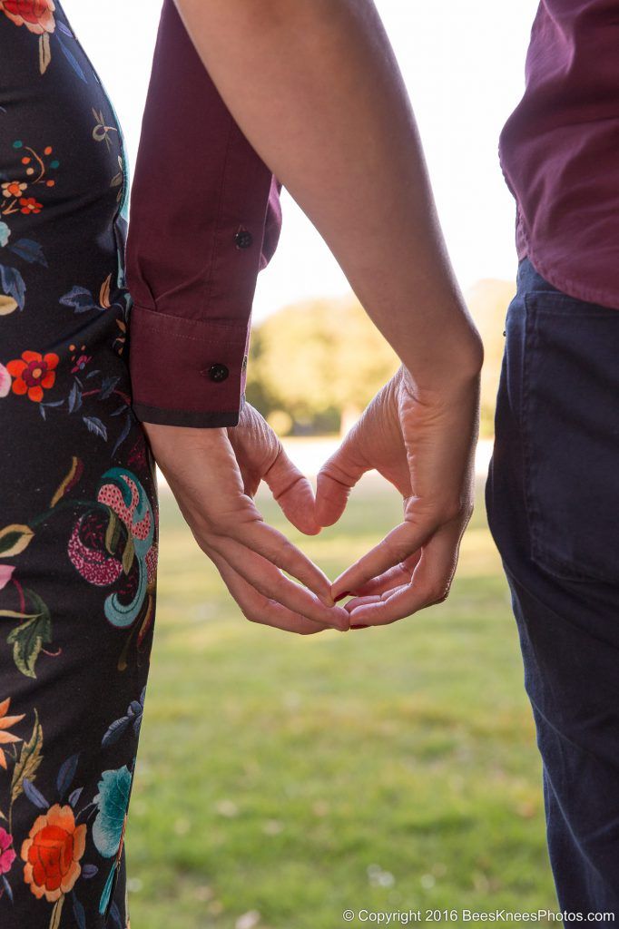 couple holding hands in the park