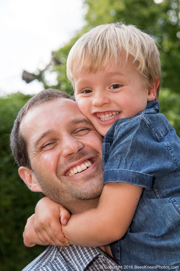 father and son having a cuddle