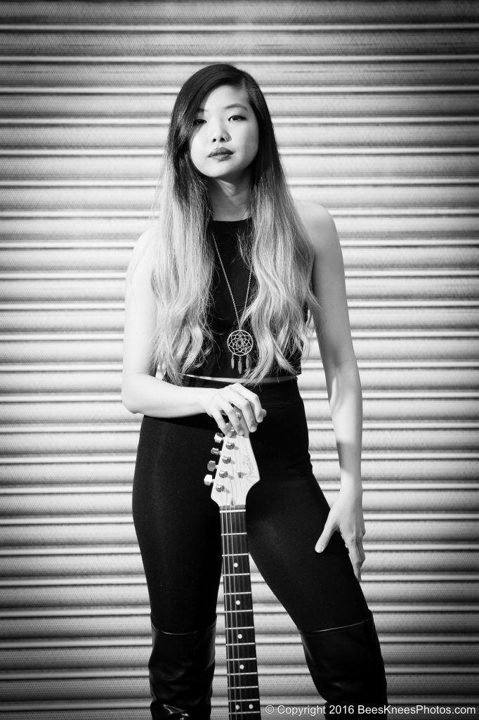 female guitarist urban photoshoot
