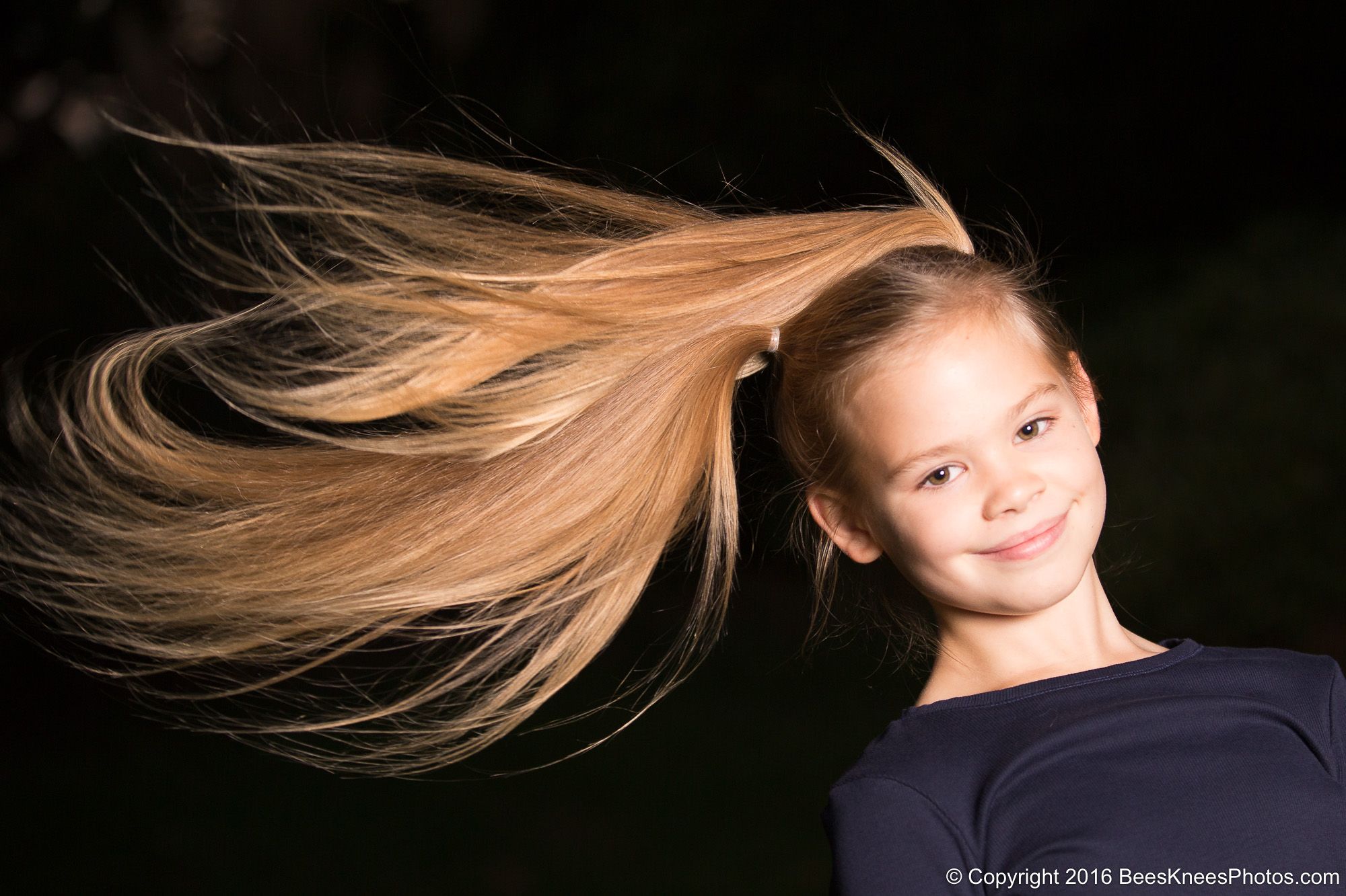 girl flicking her hair