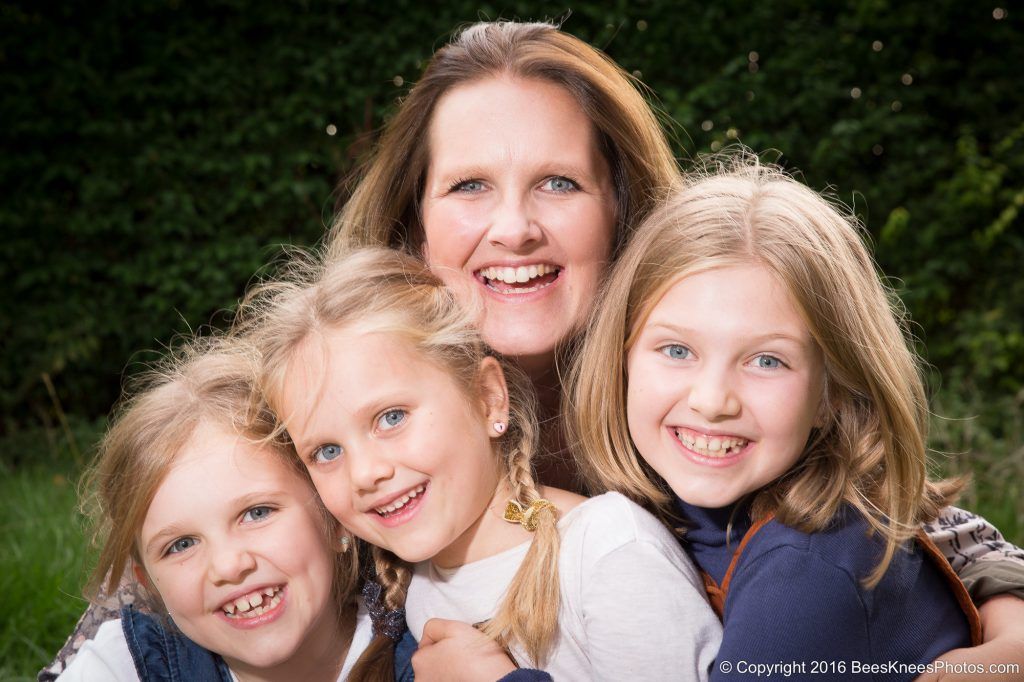 girls and their mum in the park