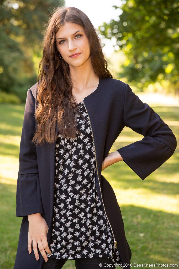photoshoot of a woman wearing navy in the park