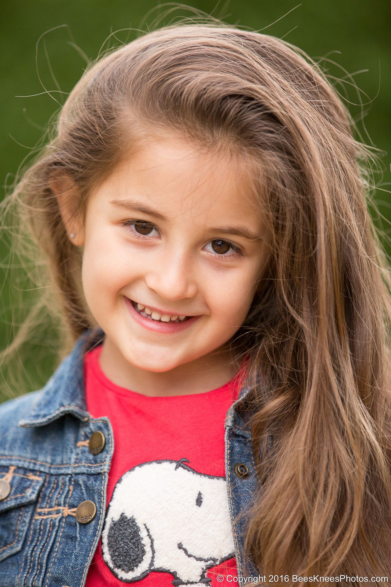 portrait of a young girl with long brown hair