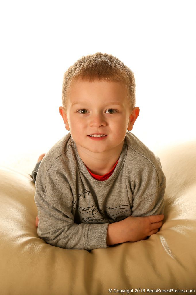 portrait photo of a young boy in the studio