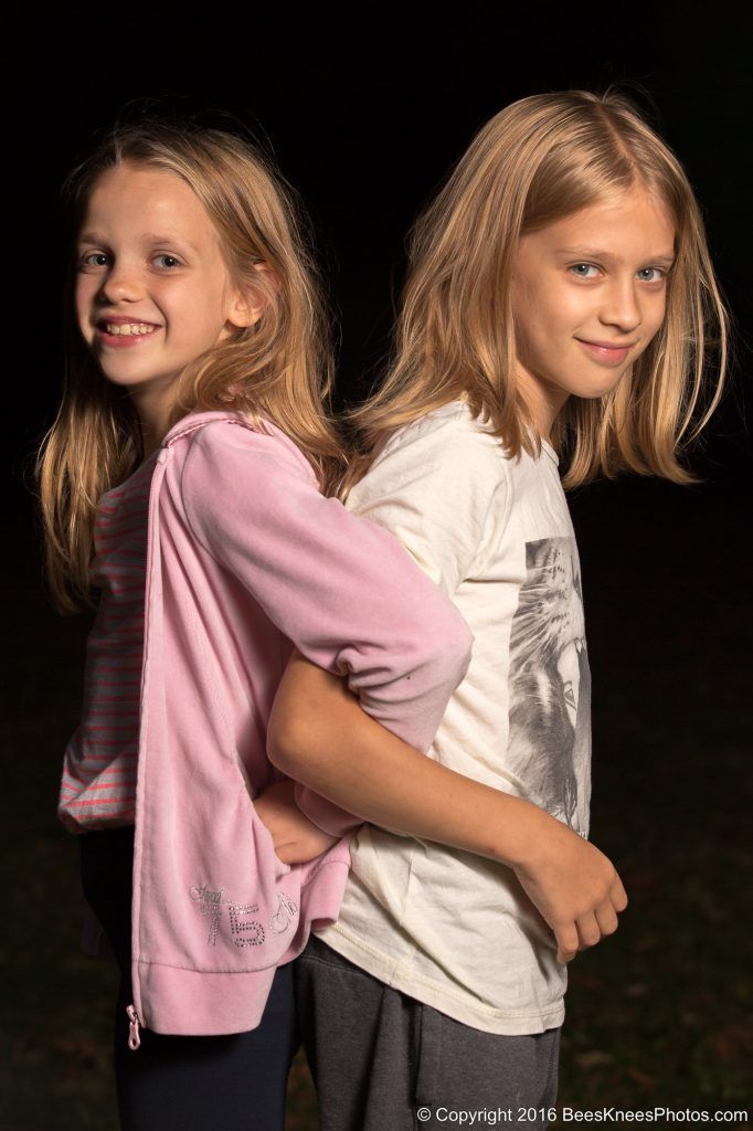 sister and brother locking arms