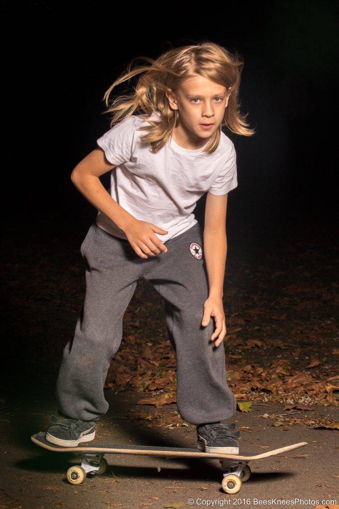 teenage boy skating in the park