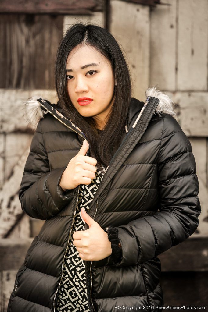 urban photo of a woman in a coat