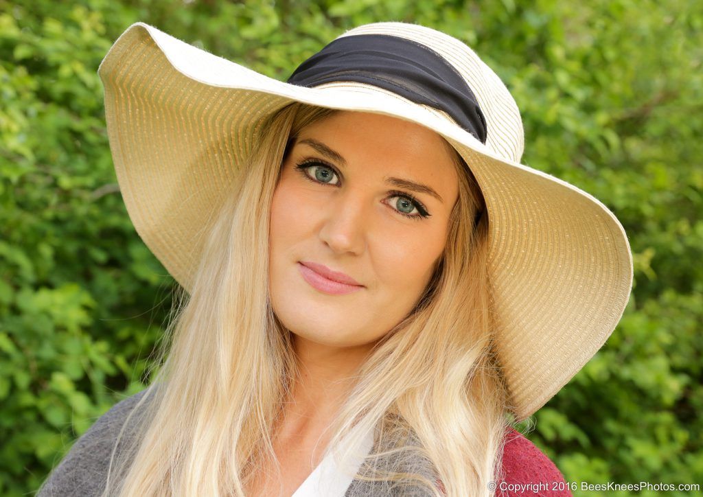 woman in a large straw hat