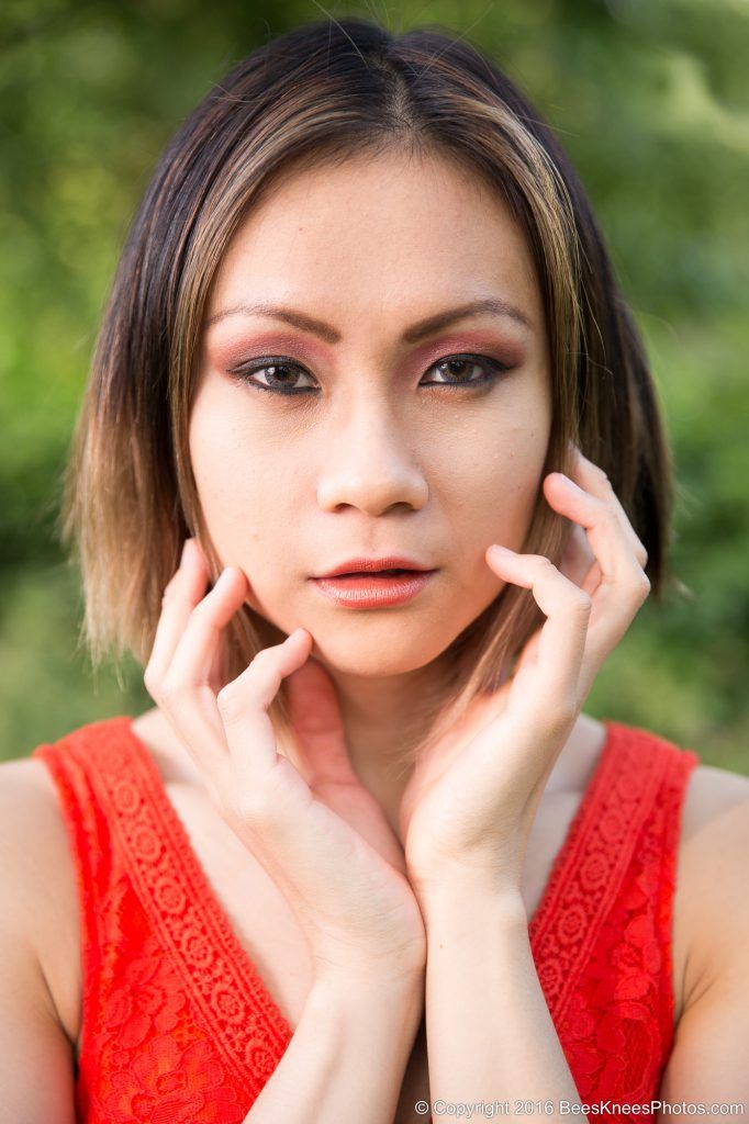 woman in an orange dress in the park