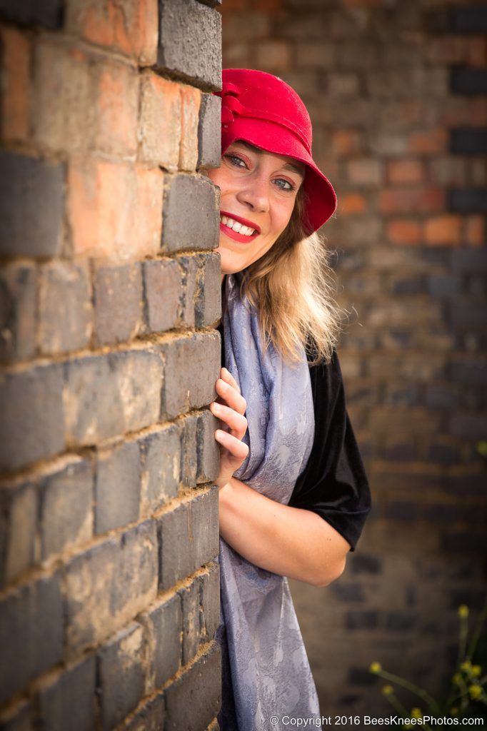 woman wearing a red hat