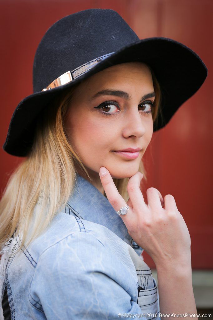 woman wearing an elegant wide brimmed hat