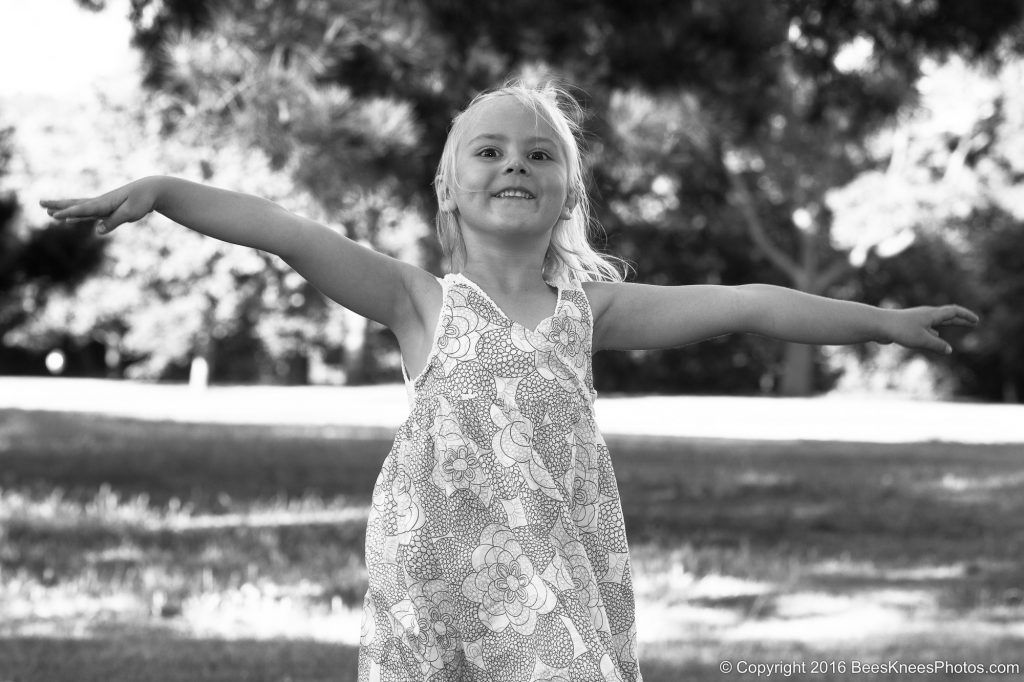 young girl dancing in the park