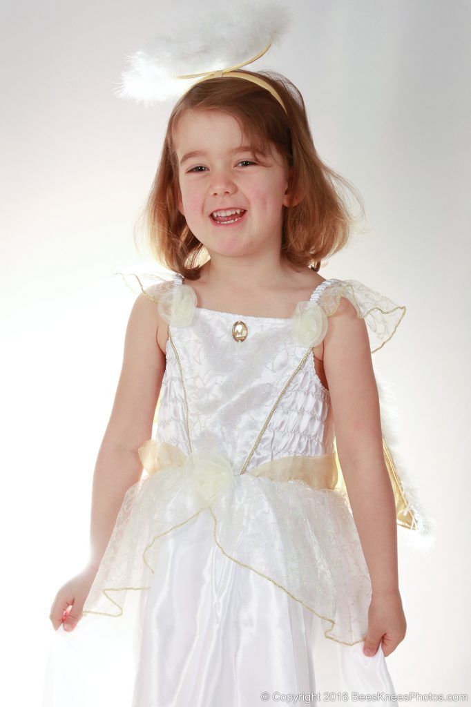 young girl in an angel dress